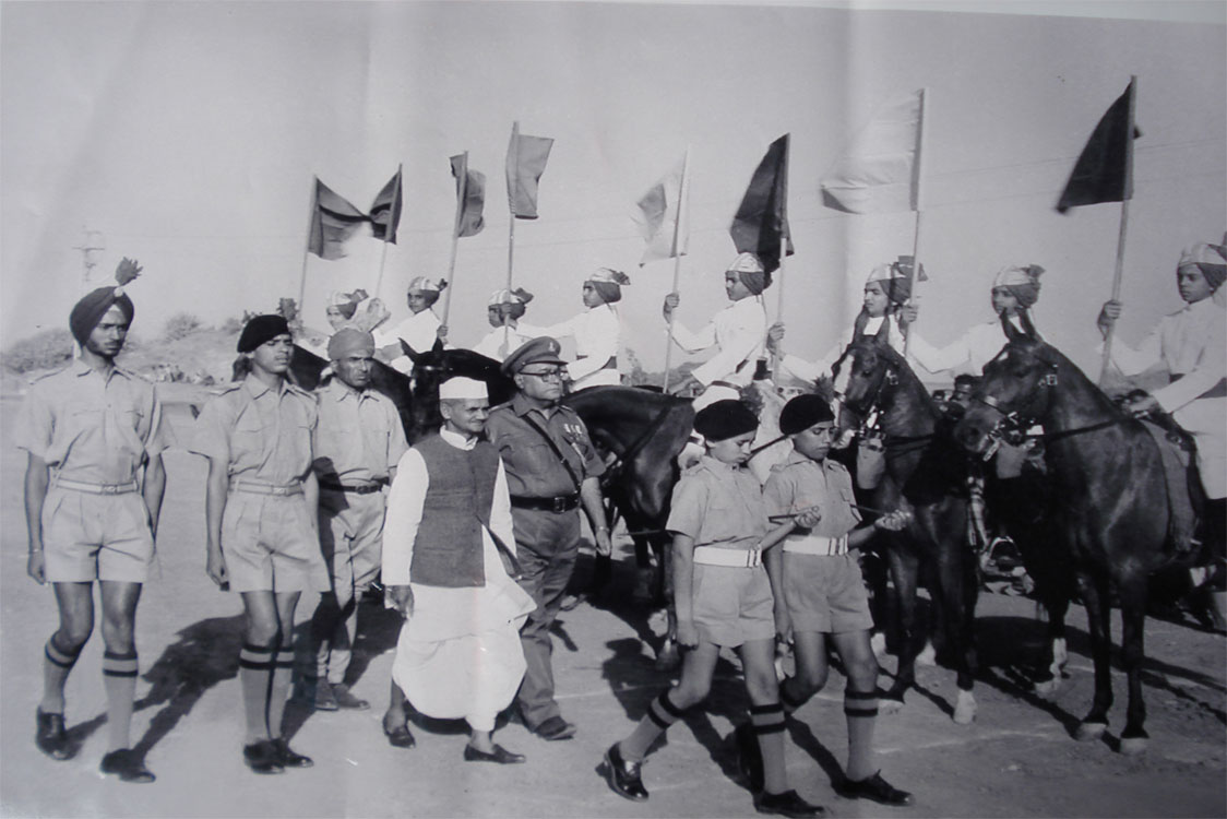 Shri Lal Bahadur Shastri, Hon’ble Prime Minister of India receiving Guard of Honour during inauguration of School's New Building at SS Balachadi 1965